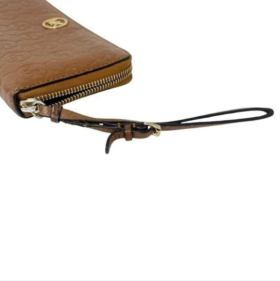 Michael Kors Leather Embossed Logo Wallet - Picture 9 of 15